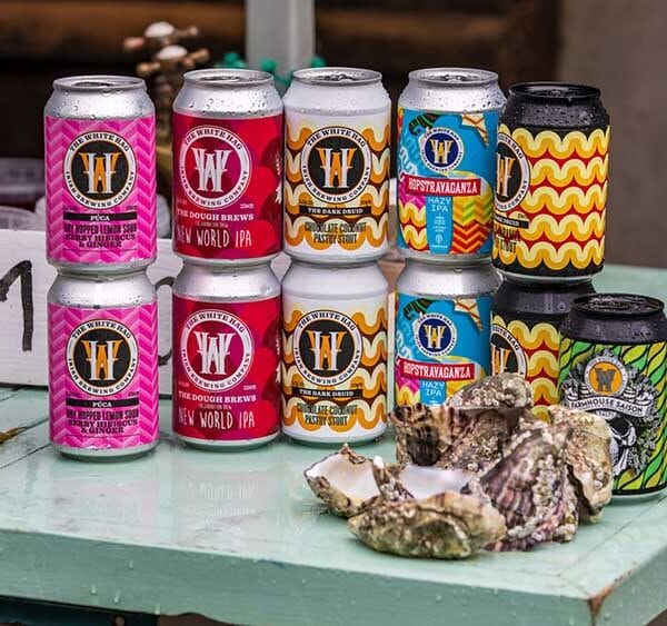 Lineup of White Hag Beer Cans.jpg